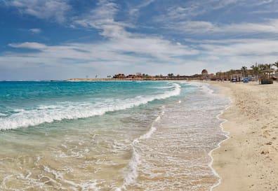The sandy beach and coral reef in Abu-Dabbab.