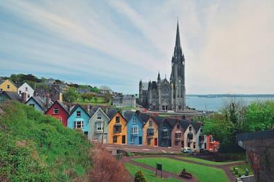 View of the colorful houses and cathedral of Cobh.