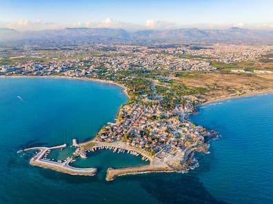 Breathtaking aerial view of the ancient city of Side in Antalya, revealing the complex design of its ruins and the stunning beauty of the surrounding nature.