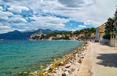 The promenade of the Croatian city of Lopud is truly picturesque.