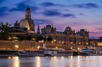 The beautiful Elbe riverfront in Dresden with landmarks in the background.