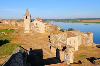 Castle fortress overlooking the water.
