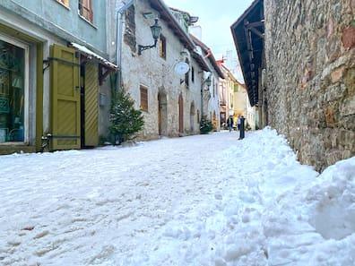 View of the snowy Catherine's Passage in Tallinn.