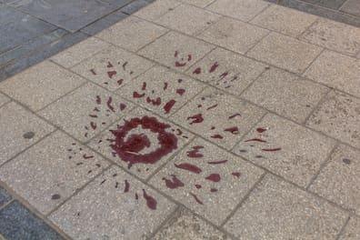A mortar hole in Sarajevo marked with a rose-shaped marking