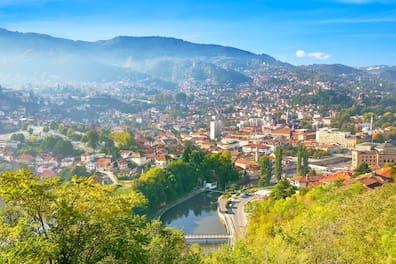 Morning mist over Sarajevo: The historic city nestles along the Miljacka River in hilly valleys.