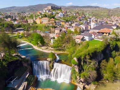 The waterfall of Jajce plunges outside the gates of the quaint old town.