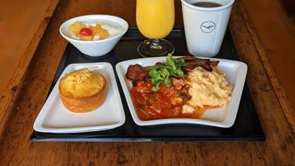 Scrambled eggs with bacon, as served by Lufthansa. Nik Sennhauser received this same dish from the airline on a flight from Munich to Singapore.