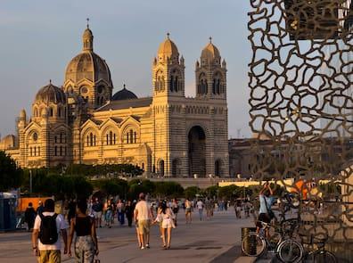 Travelers in front of Marseille's cathedral.