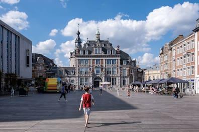 View of Place d'Armes in Namur and its surrounding buildings.