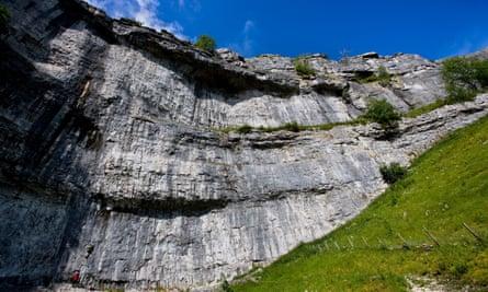 Stone walls: Looking up at the amphitheatre-shaped cliffs of Malham Cove.