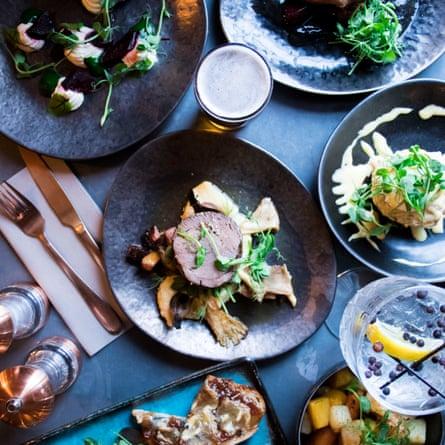 Selection of food, photographed from above, at The Cow, Dalbury Lees, UK.