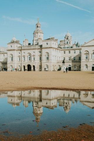 Head through the archway in Whitehall for more views of Dover House and to see the Queens Guards.
